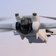 The new DJI Mini 3 in flight against a pastel pink and blue backdrop.